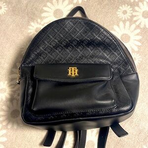 Black leather Tommy Hilfiger backpack.